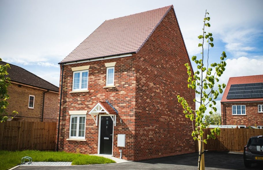 Modern brick family house front view – ideal for house removals in Wrexham. Modern brick family house front view – ideal for home removals in Wrexham.